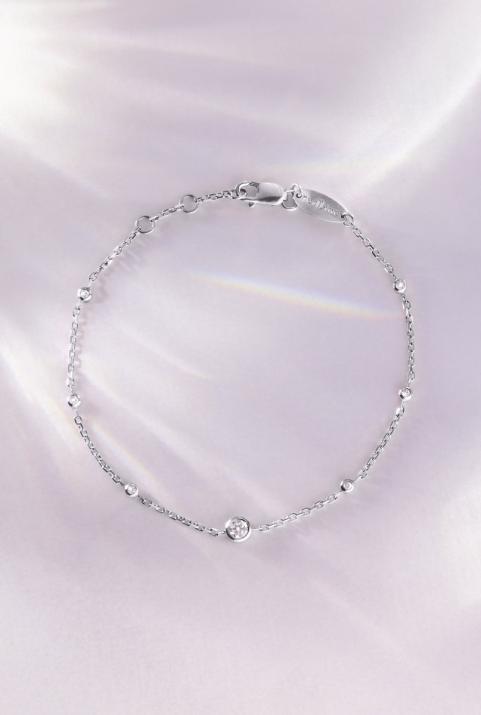 Bracelet chaîne avec un diamant entouré de petits diamants en serti clos or blanc - Redline - 0++