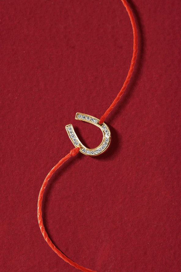 Le fil rouge porte bonheur